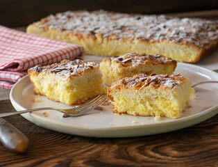 Butter cake and almonds on a bplate