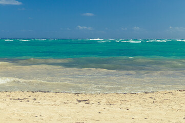 Turquoise ocean and sand beach landscape.