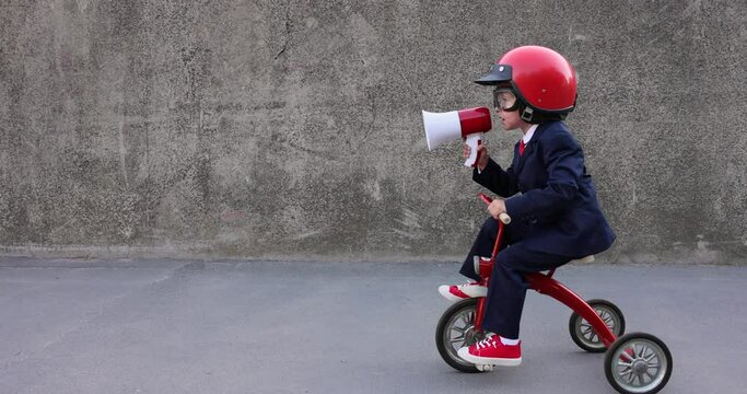 Funny businessman driving retro trike outdoor. Slow motion 4K