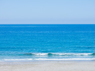 Mediterranean Sea with a fragment of the beach in calm weather