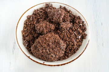 unhealthy granulated instant coffee grounds spoiled by mold in a bowl