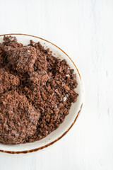 unhealthy granulated instant coffee grounds spoiled by mold in a bowl