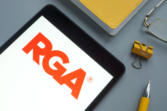 KYIV, UKRAINE - December 03, 2021. Reinsurance Group of America RGA logo and pen.