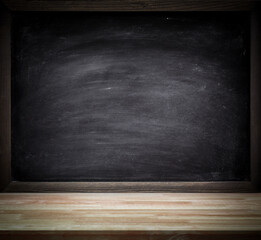 Wooden plank table for graphic stand product, interior design or montage display your product with blank texture blackboard with chalk for background. education concept.
