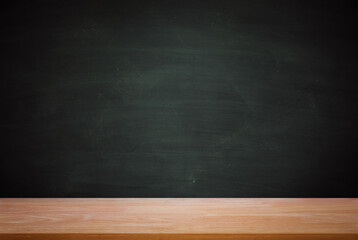 Wooden plank table for graphic stand product, interior design or montage display your product with blank texture blackboard with chalk for background. education concept.