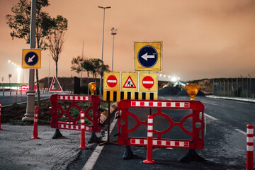 Traffic sign road construction work and construction site night scene