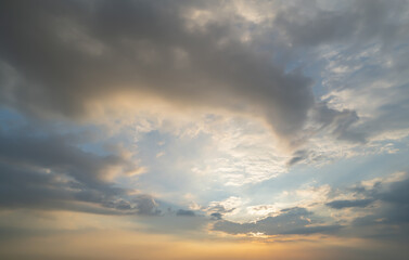 Sunset sky. Abstract nature background. Dramatic blue with orange colorful clouds in twilight time.