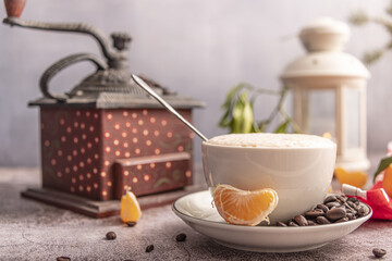 Morning breakfast.Still life with coffe, cakes, cinnamon, nuts and branches of spruce.