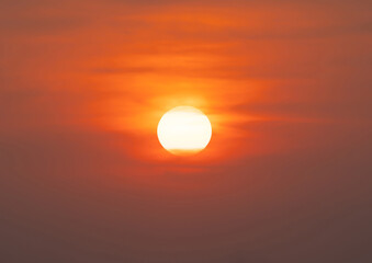 The Sun with sunset sky. Abstract nature background. Dramatic blue with orange colorful clouds in twilight time.