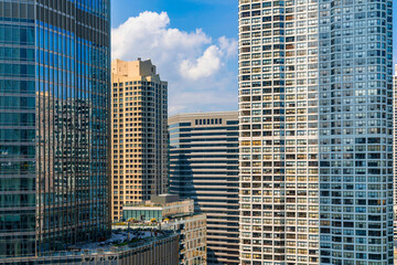 Aerial panoramic city view of Chicago downtown area at day time, Illinois, USA. Bird's eye view of skyscrapers facades at financial district, skyline. A vibrant business neighborhood.