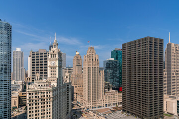 Fototapeta na wymiar Aerial panoramic city view of Chicago downtown area at day time, Illinois, USA. Bird's eye view of skyscrapers at financial district, skyline. A vibrant business neighborhood.