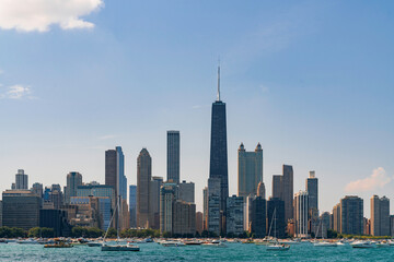 Obraz premium A picturesque view of Downtown skyscrapers of Chicago skyline panorama over Lake Michigan at daytime, Chicago, Illinois, USA
