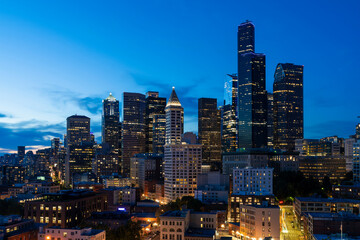 Illuminated aerial cityscape of Seattle, downtown at night time, Washington, USA.