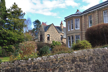 Exterior 19th Century Houses and Stone Wall seen from Public Road 