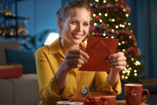 Woman reading a Christmas card