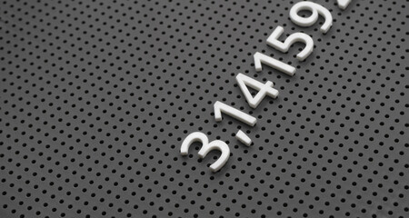 the number Pi on grey background. Copy space