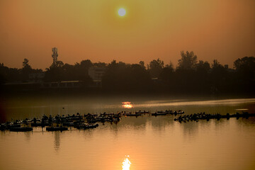 Obraz premium Bird valley lake near Pune. Beautiful background of bird valley. Scenic photo. Sunrise photo.