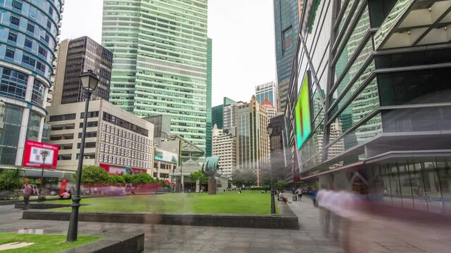 Skyscraper towers at Raffles Place in Singapore Financial Centre timelapse hyperlapse