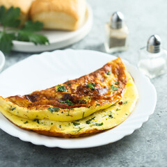 Traditional homemade omelette with herbs