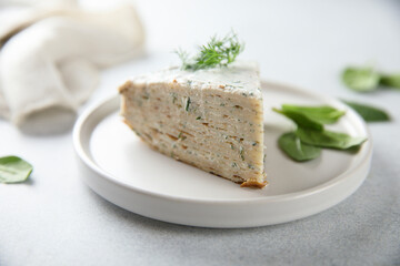 Homemade savory crepes cake with dill and spinach