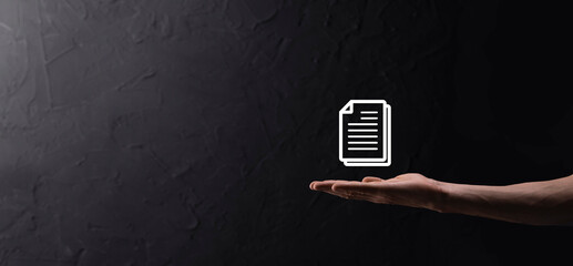 Male hand holding a document icon on blue background. Document Management Data System Business Internet Technology Concept. Corporate data management system DMS