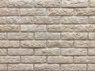 beige brick wall. stone wall texture.