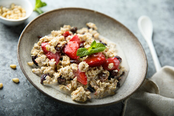 Healthy homemade muesli or oatmeal porridge with strawberry