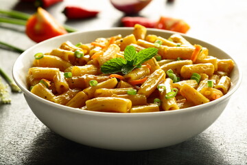 Homemade delicious breakfast food- vegetarian diet meal- pasta penne with fresh cream and cheese.