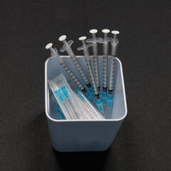 Medical Equipment that includes Syringes with Hypodermic Needles with Safety Caps