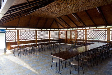Gazebo interior with tables and chairs