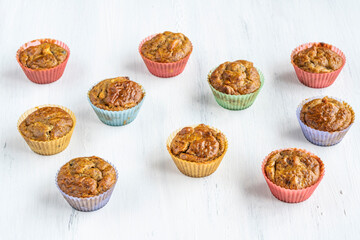 background with small cakes on white table
