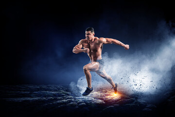 Fototapeta Male runner against dark background obraz