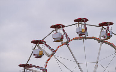 Rotating wheel carousel at a Christmas market. Beautiful setup for the winter holidays.