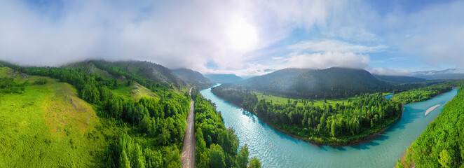 wildlife in summer europe. river mountains hills and morning fog, the mood for a trip is a breathtaking panorama view. the road along the river with turquoise water , clean air and open spaces