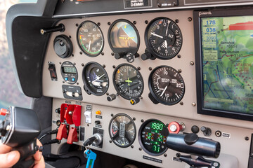 Cockpit interior instruments of a Robin DR-400 plane