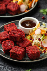 Beetroot and hazelnut bites with pomegranate glaze, vegetarian, vegan party finger food