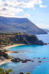 Cliffs and turquoise water in Italy