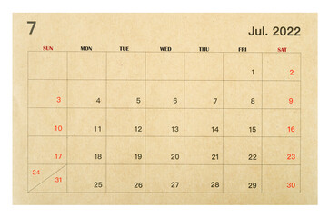 July 2022 brown calendar made from recycled paper isolated on white background.