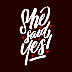 she said yes white lettering sign.modern typography design.vdector illustration.handwritten brush font on a black background.perfect for banner,bridal showewr or engagement party invitation,etc