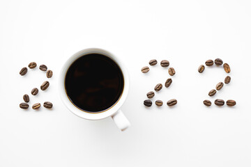 roasted coffee beans arrange on white background 2022 for new year concept background 