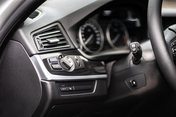 Obraz na płótnie Canvas Control panel dashboard car fragment. Automatic transmission gear shift in car