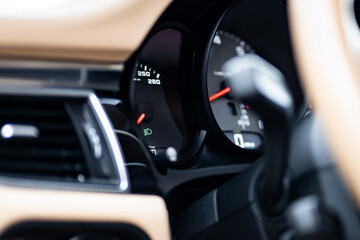 Fototapeta na wymiar Control panel dashboard car fragment. Automatic transmission gear shift in car