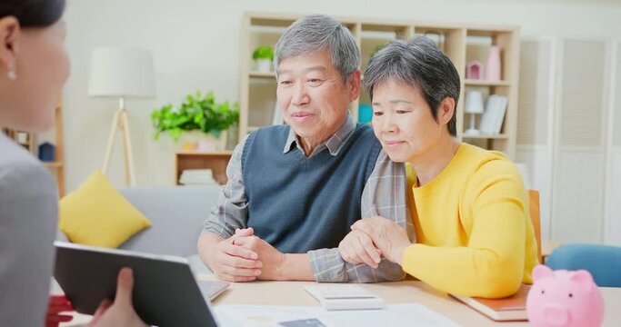 asian elderly couple buy house