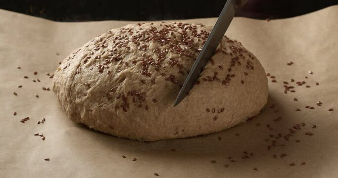Preparation of dough for baking bread at home. Decorating bread. 4K slow motion.