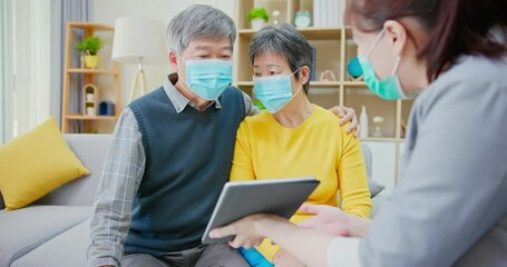 asian elderly couple buy house - Powered by Adobe