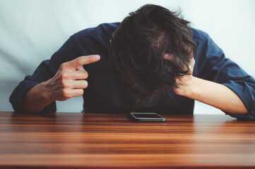 Man stressed with hair loss problem. thinning hair. scalp problems