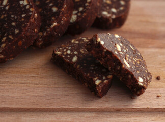 biscuit cake with pine nuts on a beige background