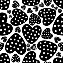 Seamless pattern of black perforated hearts on a white background. Vector illustration. Design for Valentines Day