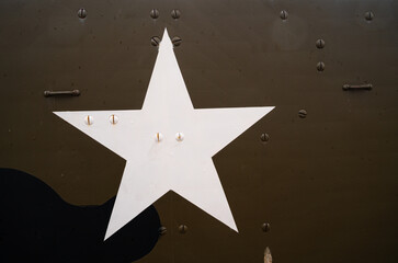 Arromanches, France - August 2, 2021: White star - symbol on the vehicles of american army in the...