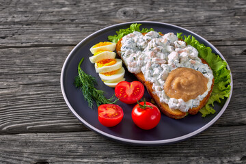 danish smorrebrod with shrimps, mayo, roe, and egg